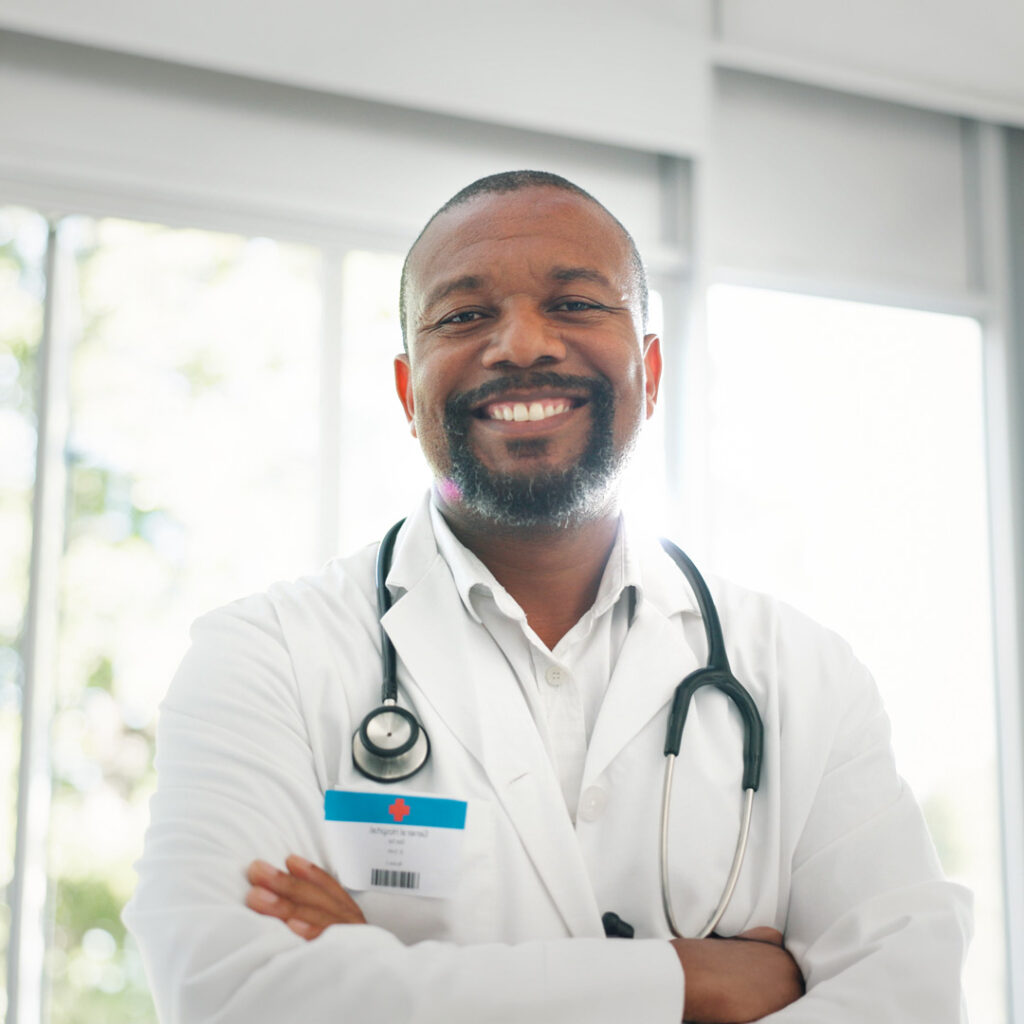Smiling occupational health doctor in a clinical setting