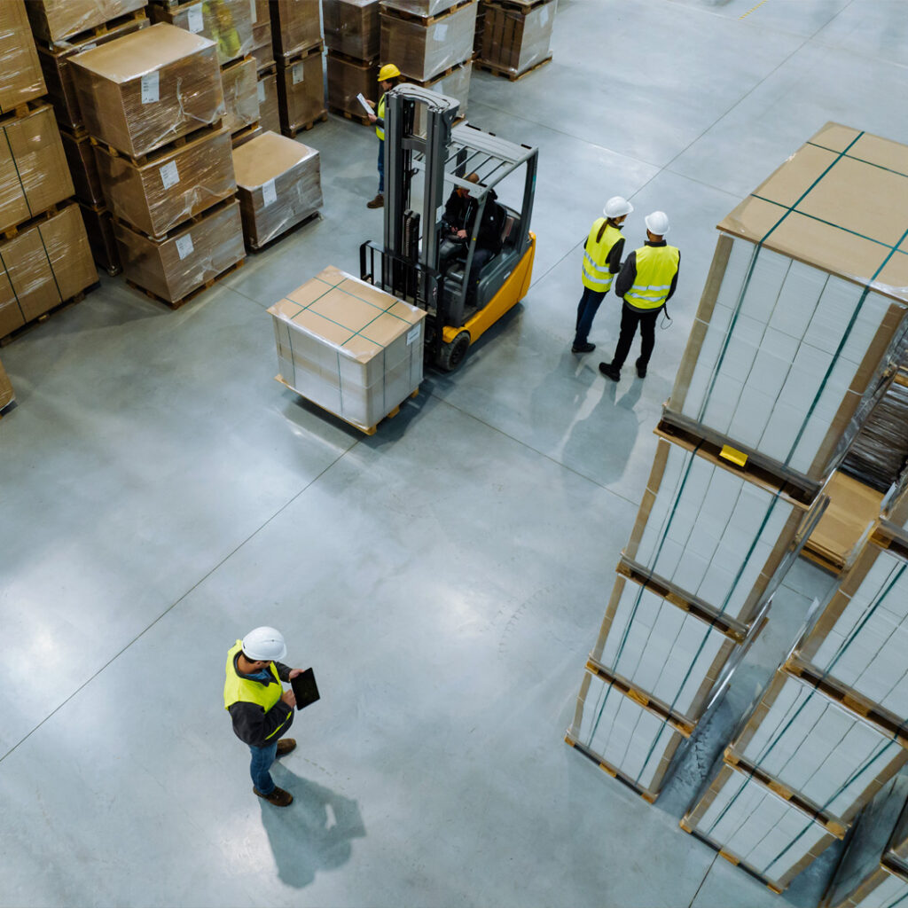 Warehouse storage racks and industrial goods in a distribution facility